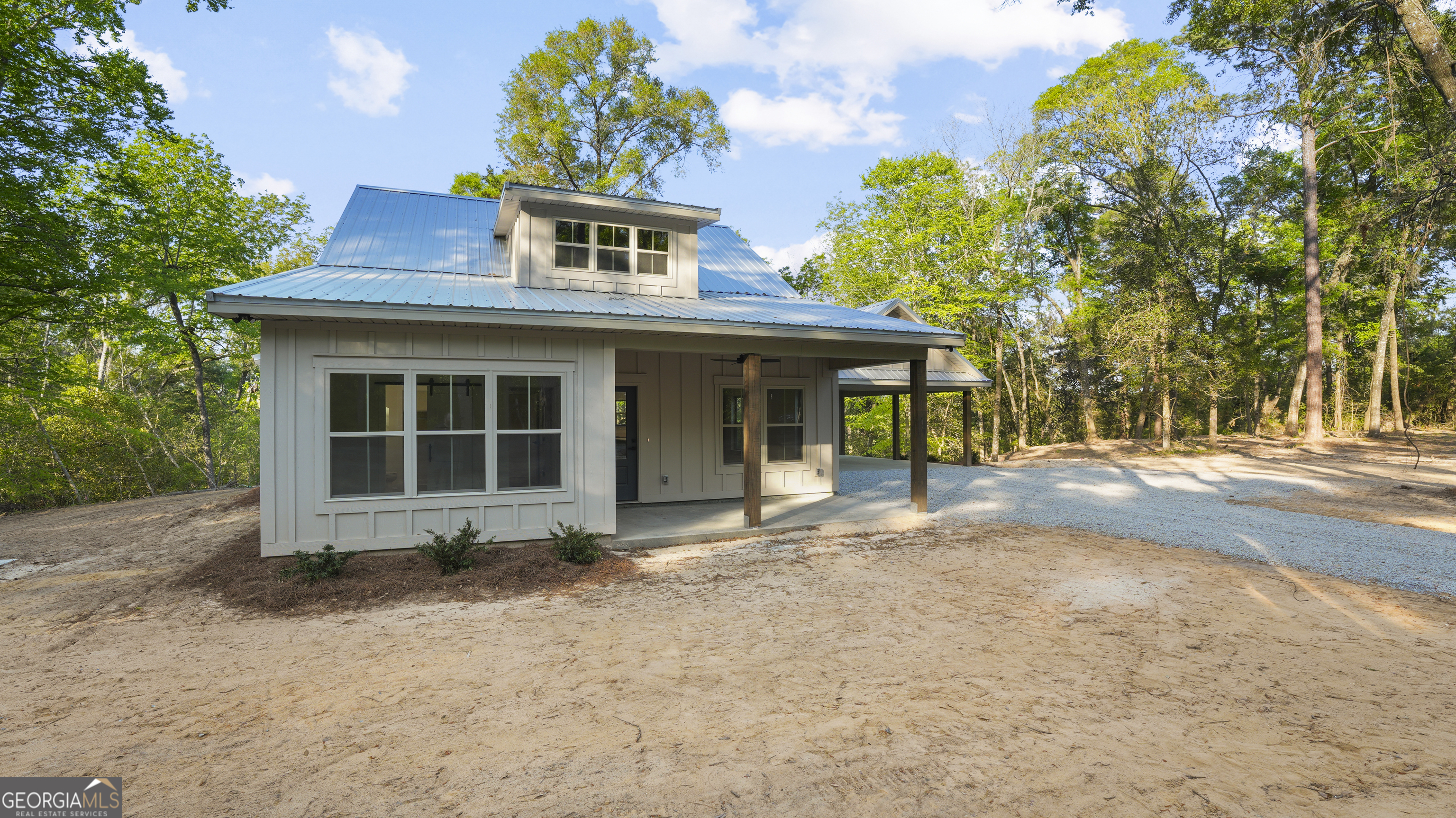 150 Lakeview Drive Jesup, GA 31545 - Photo 9 of 34 a front view of a house with a yard