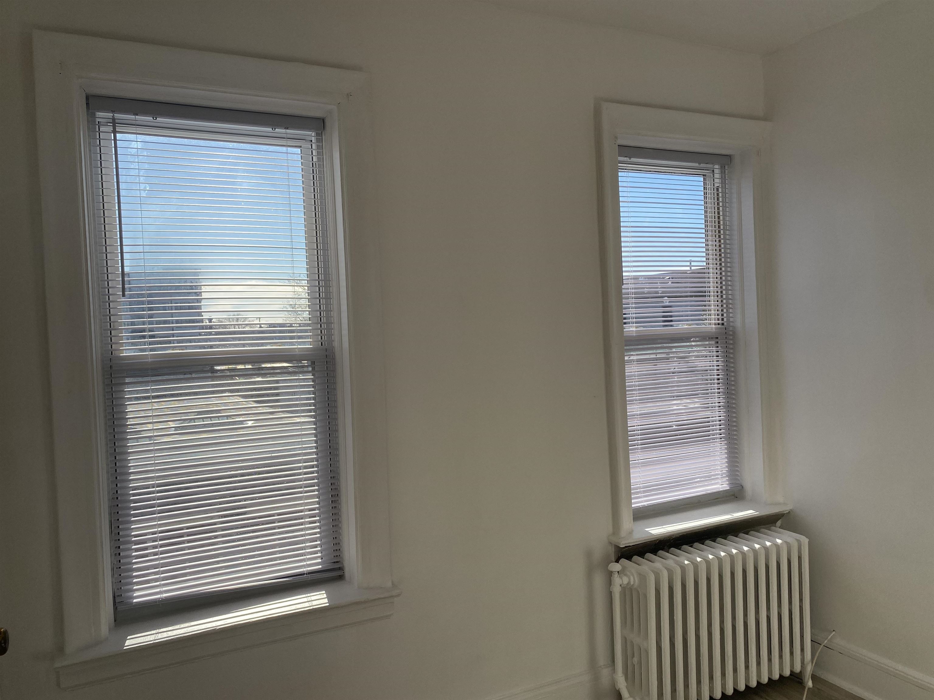 19 Fox Place, Unit 3 Jersey City, NJ 07306 - Photo 8 of 18 a view of a livingroom with a window