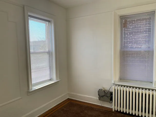 a view of a room with a window