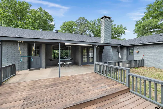 a balcony view with a seating space