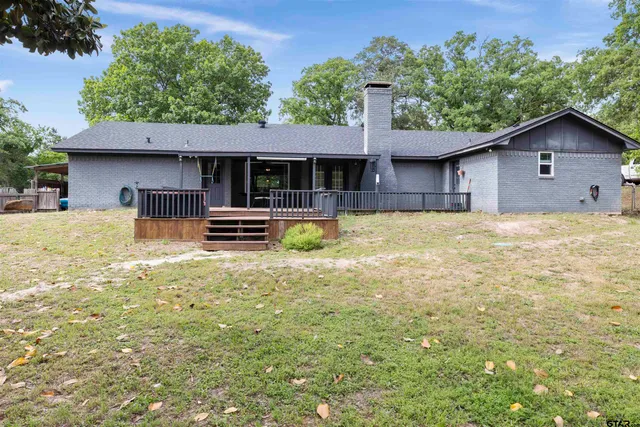 a house view with a garden space