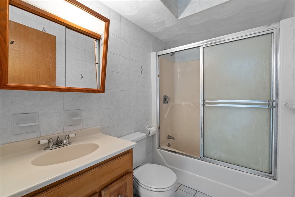 70 North Court Street, Unit F Fall River, MA 02720 - Photo 13 of 20 a bathroom with a sink toilet and shower