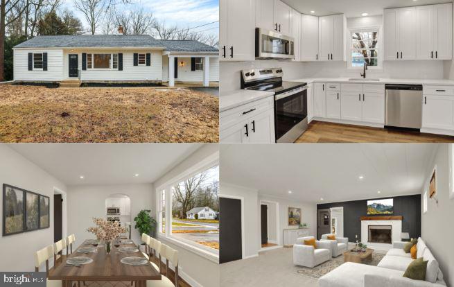 311 Pine Road Mount Holly Springs, PA 17065 - Photo 1 of 44 a kitchen with stainless steel appliances kitchen island granite countertop a refrigerator oven a sink dishwasher and white cabinets with wooden floor