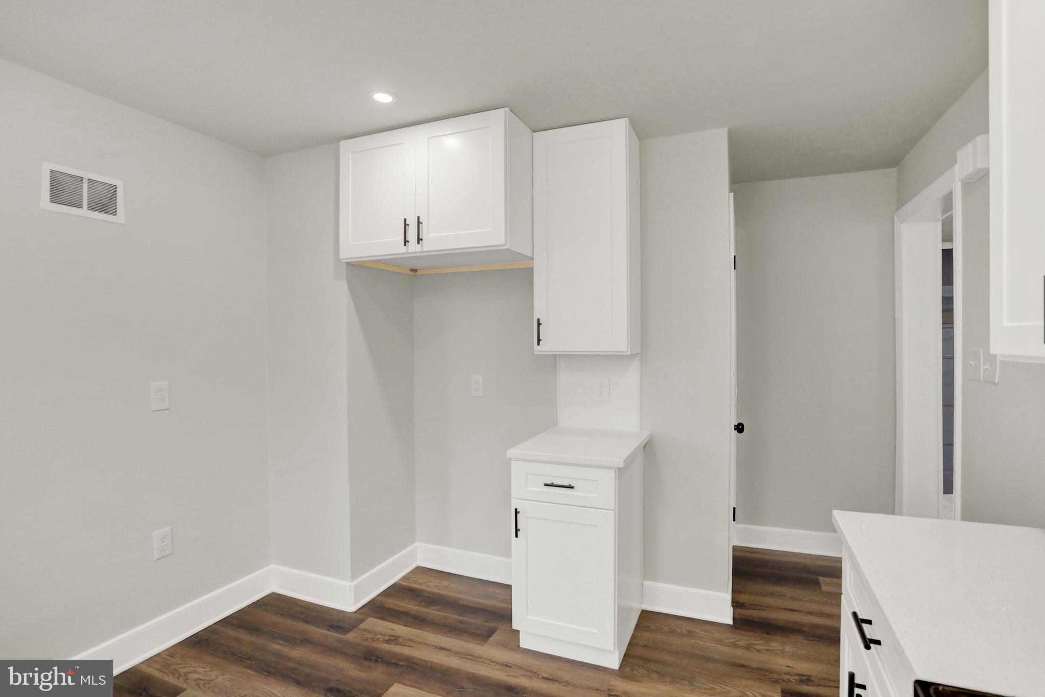 311 Pine Road Mount Holly Springs, PA 17065 - Photo 15 of 44 a view of empty room with wooden floor