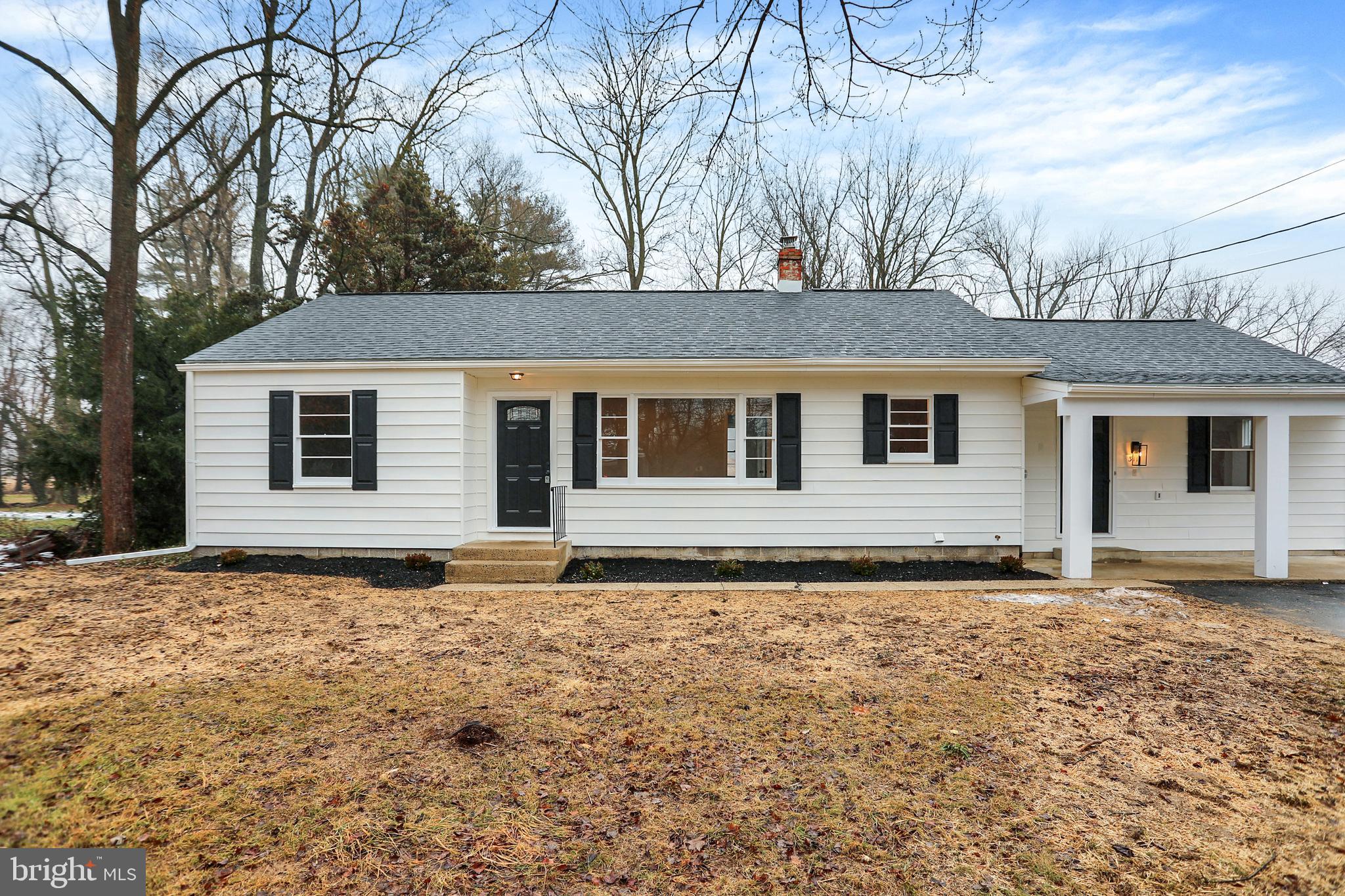 311 Pine Road Mount Holly Springs, PA 17065 - Photo 2 of 44 a house with trees in the background