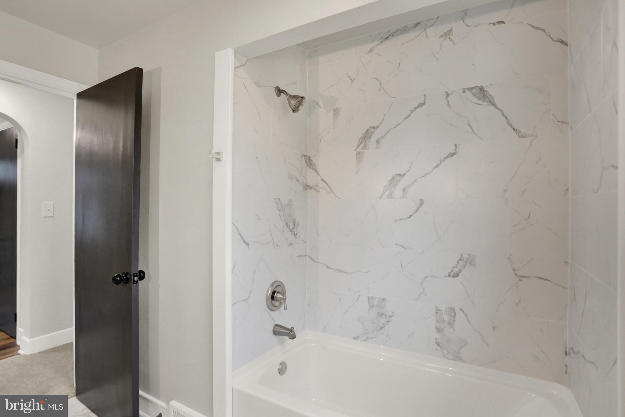 311 Pine Road Mount Holly Springs, PA 17065 - Photo 21 of 44 a bathroom with a bathtub