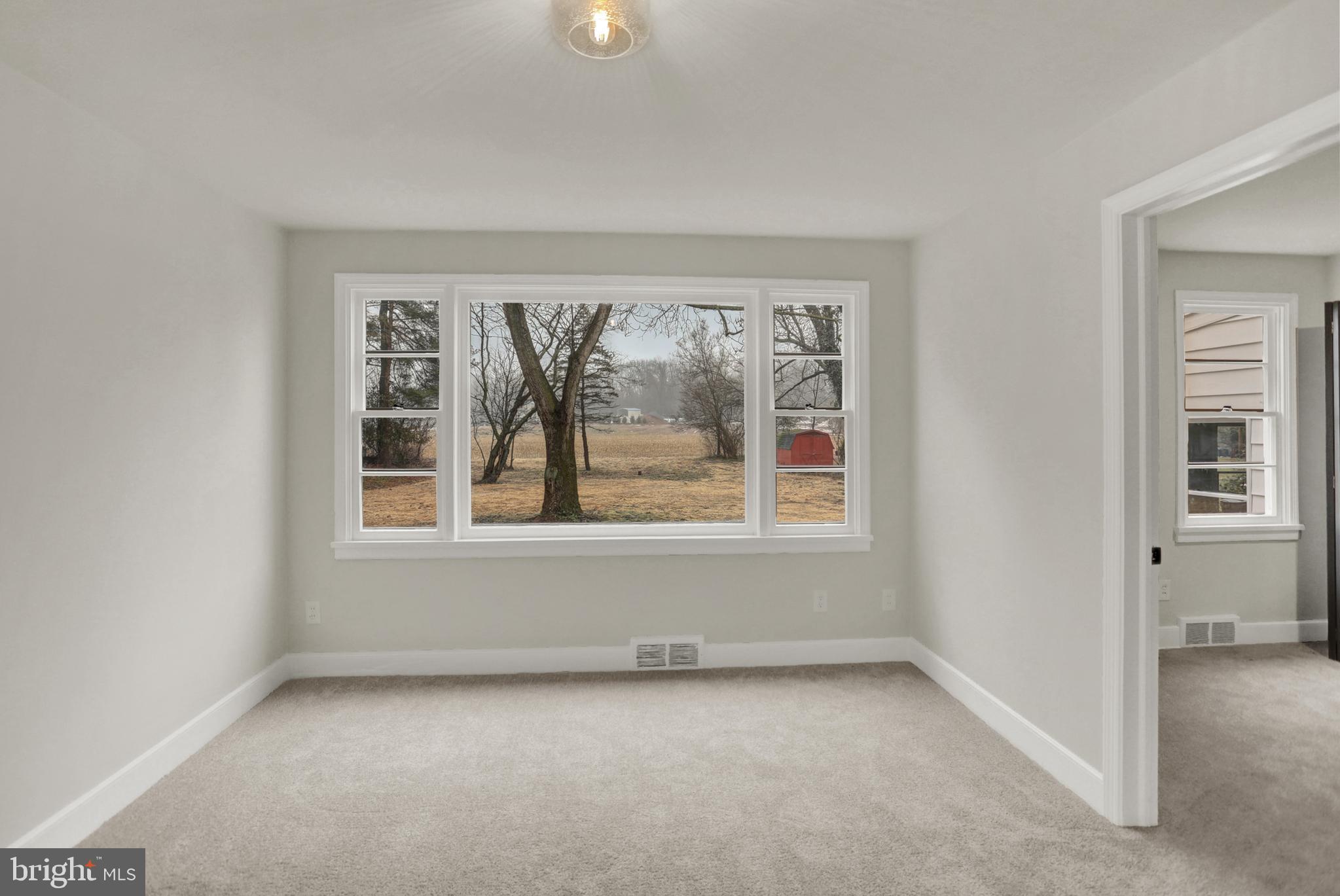 311 Pine Road Mount Holly Springs, PA 17065 - Photo 22 of 44 an empty room with a window