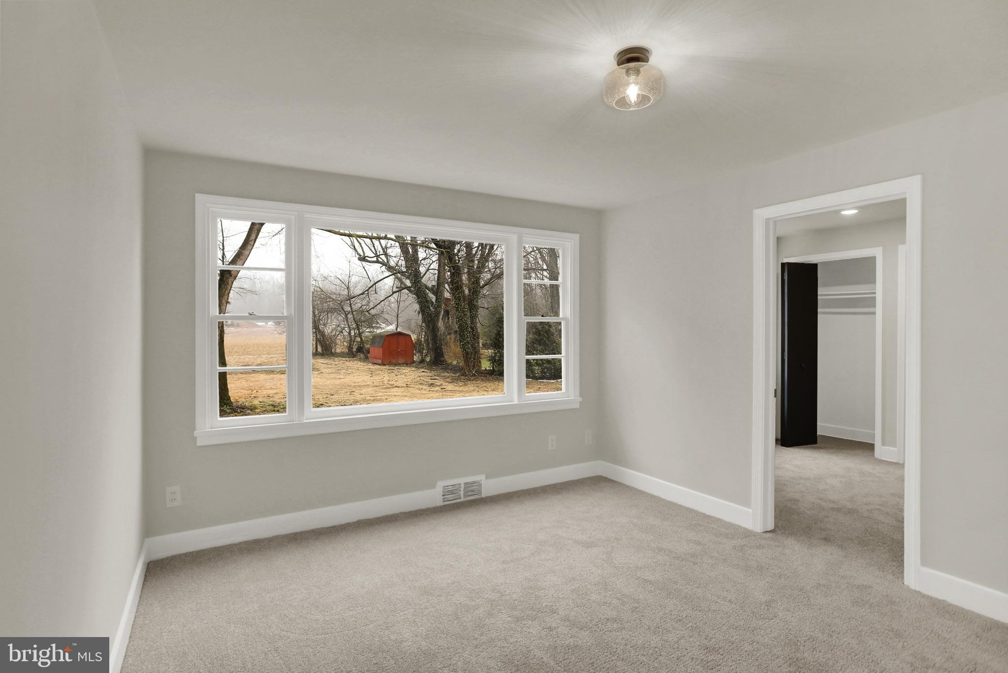 311 Pine Road Mount Holly Springs, PA 17065 - Photo 23 of 44 an empty room that has a window