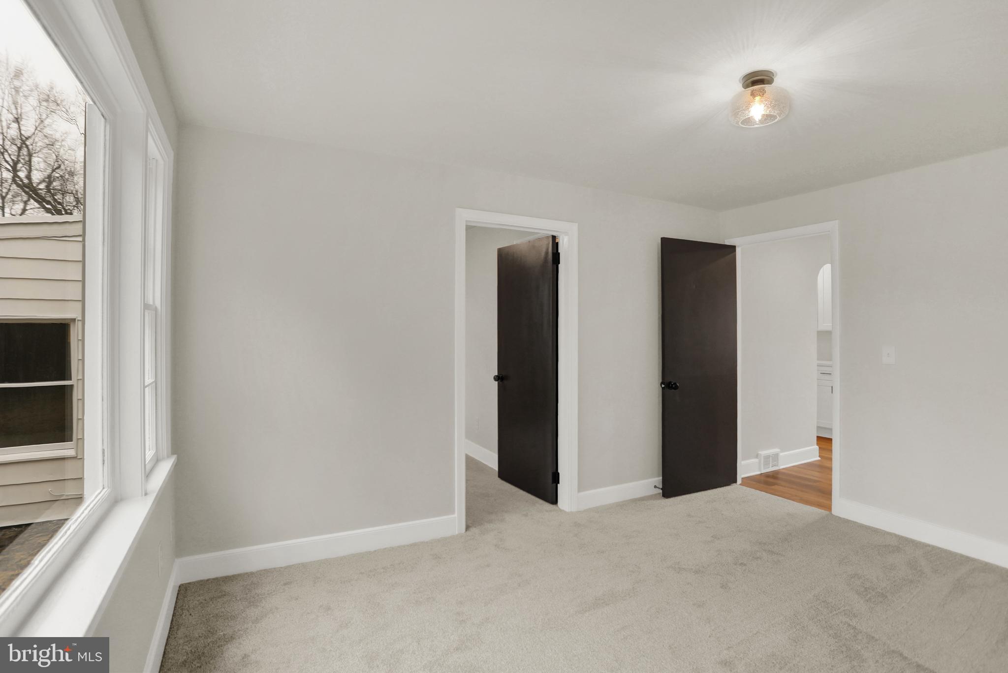 311 Pine Road Mount Holly Springs, PA 17065 - Photo 27 of 44 an empty room with windows and closet