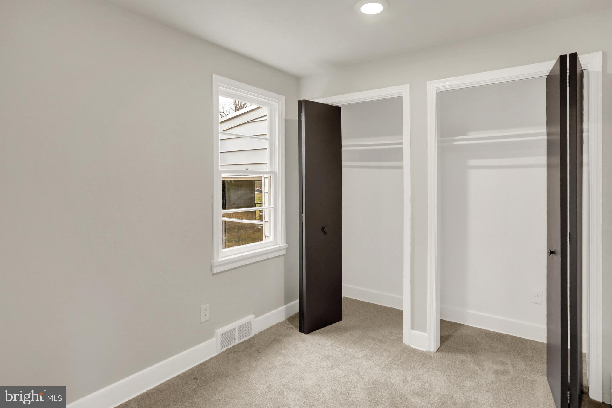 311 Pine Road Mount Holly Springs, PA 17065 - Photo 28 of 44 an empty room with windows and closet