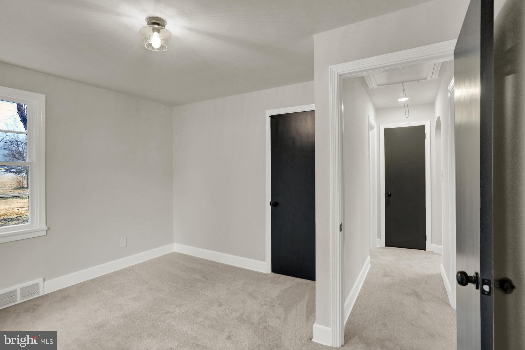 311 Pine Road Mount Holly Springs, PA 17065 - Photo 29 of 44 an empty room with windows and closet