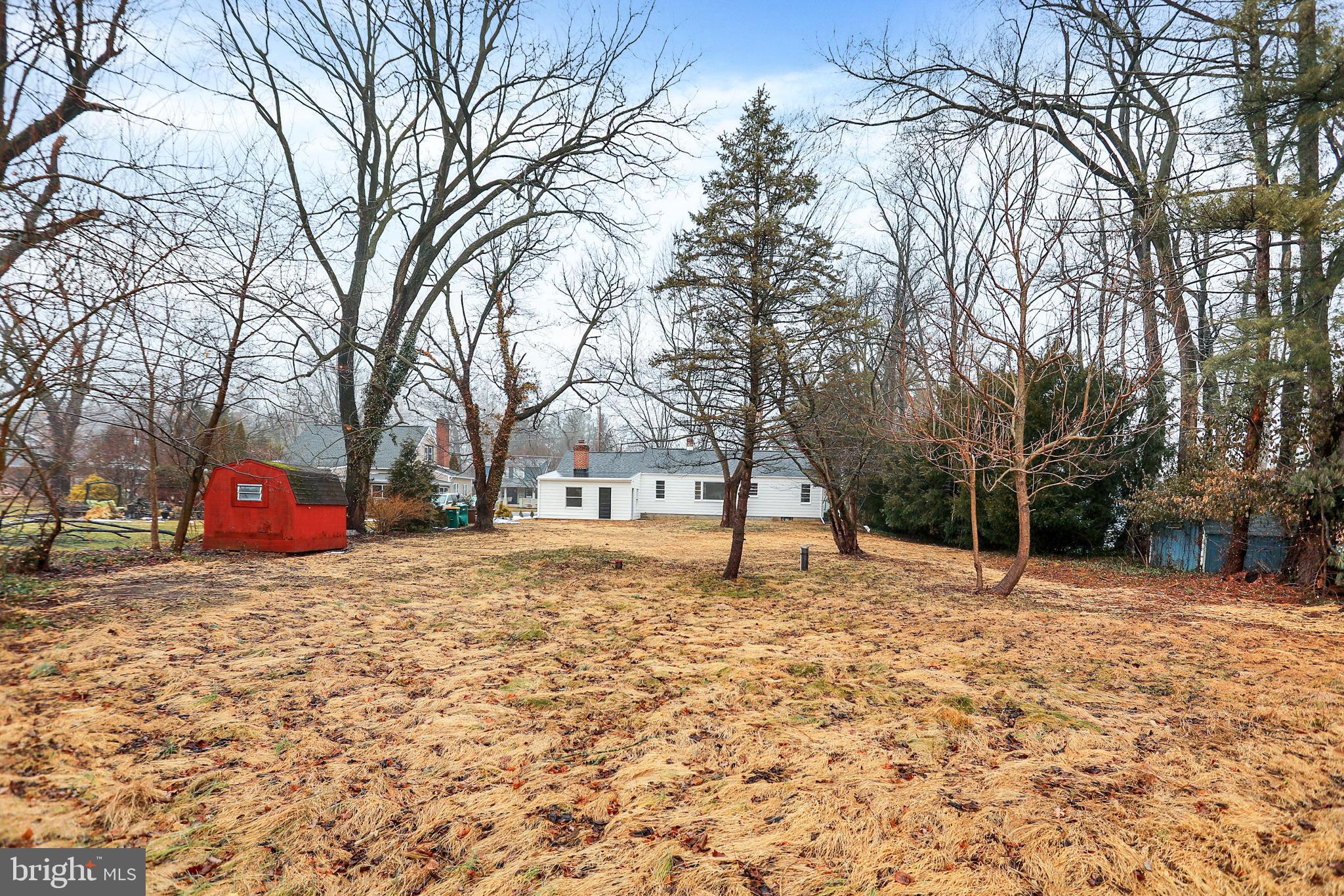 311 Pine Road Mount Holly Springs, PA 17065 - Photo 37 of 44 a house with trees in front of it