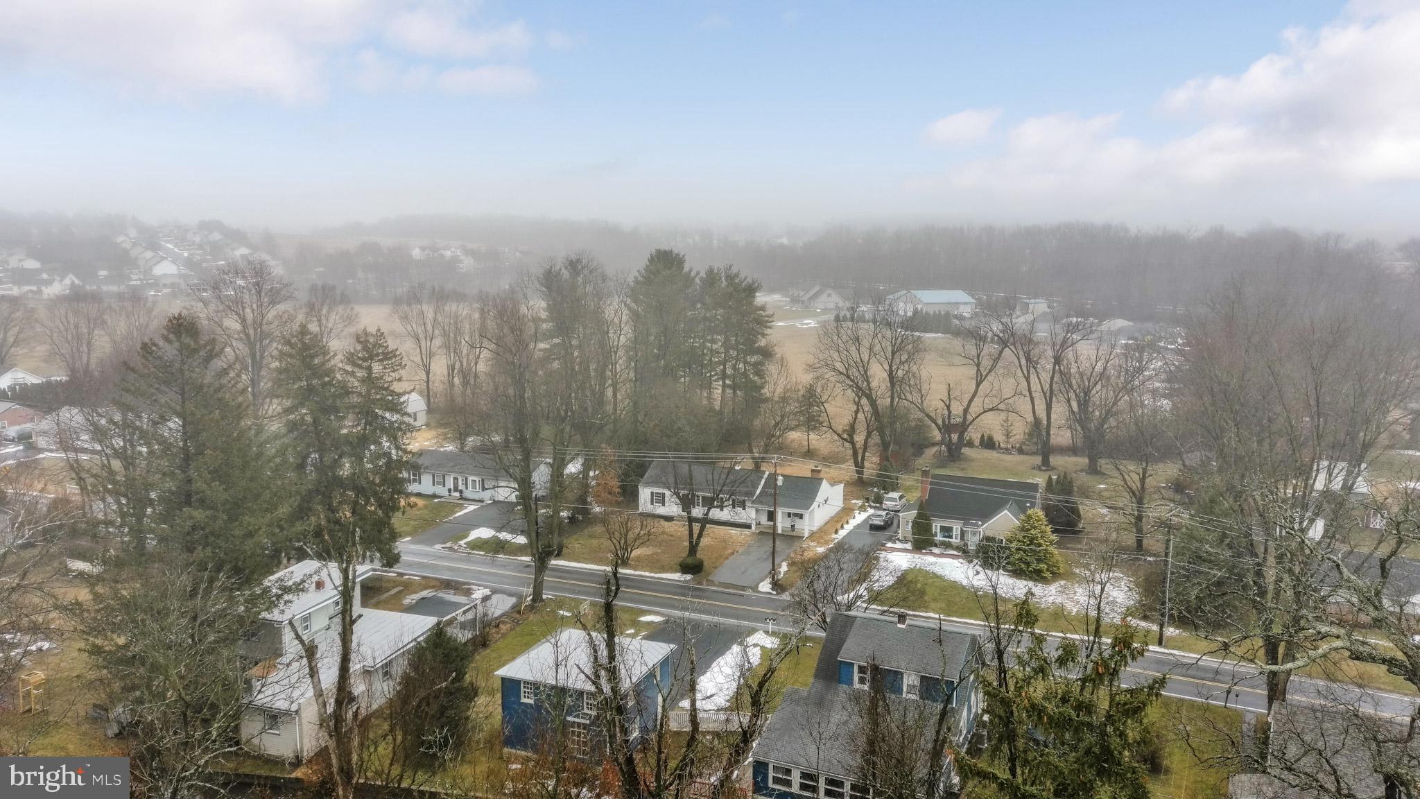 311 Pine Road Mount Holly Springs, PA 17065 - Photo 42 of 44 a view of a city with tall buildings