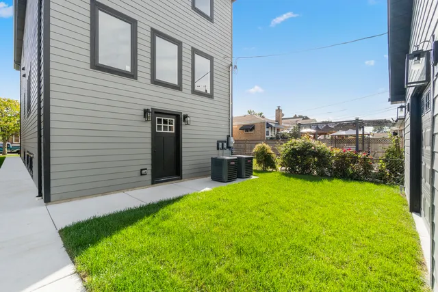 a view of a backyard of the house