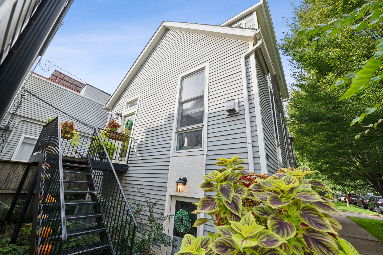 1809 West Melrose Street Chicago, IL 60657 - Photo 1 of 25 a view of a house with a backyard