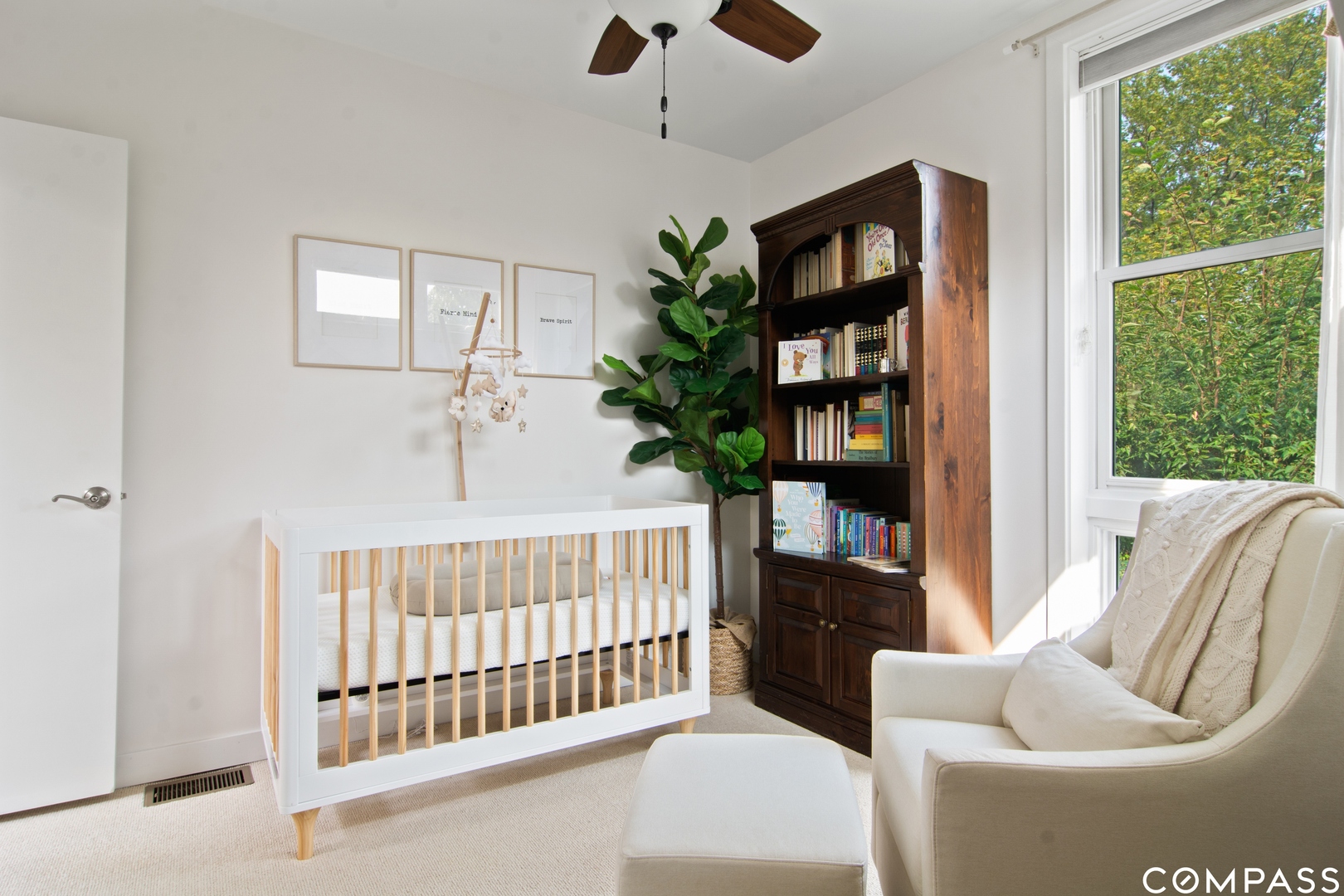 1809 West Melrose Street Chicago, IL 60657 - Photo 14 of 25 a bedroom with furniture and a book shelf