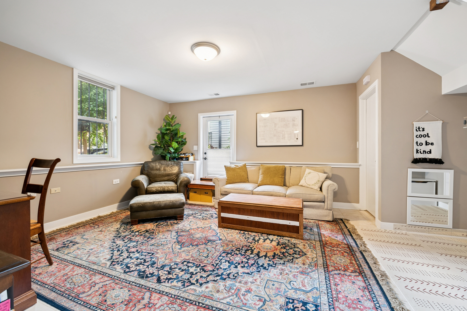 1809 West Melrose Street Chicago, IL 60657 - Photo 16 of 25 a living room with furniture and a rug