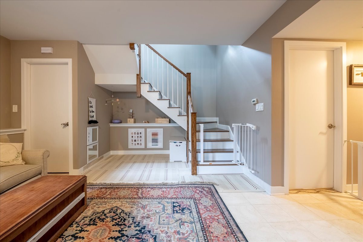 1809 West Melrose Street Chicago, IL 60657 - Photo 18 of 25 a view of entryway and hall with wooden floor