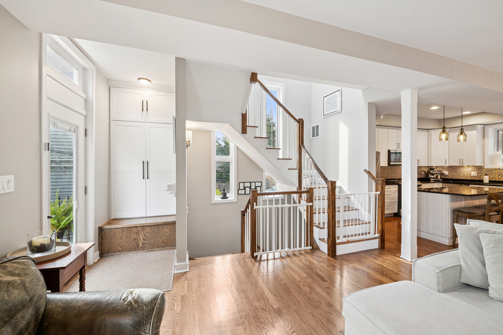 1809 West Melrose Street Chicago, IL 60657 - Photo 3 of 25 a living room with furniture and a wooden floor