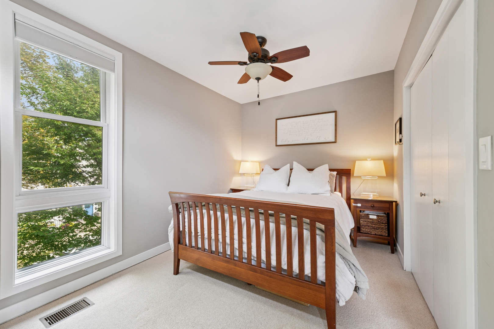 1809 West Melrose Street Chicago, IL 60657 - Photo 9 of 25 a bedroom with a bed and window