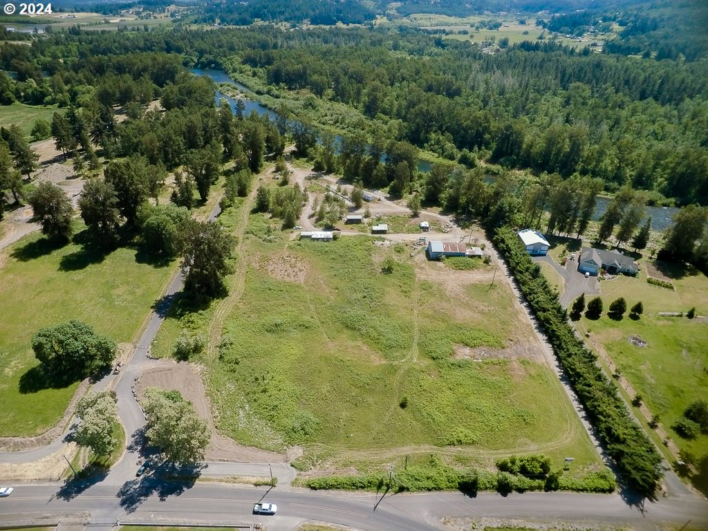 33065 Tennessee Road Southeast, Unit 2 Lebanon, OR 97355 - Photo 4 of 10 an aerial view of residential houses with yard