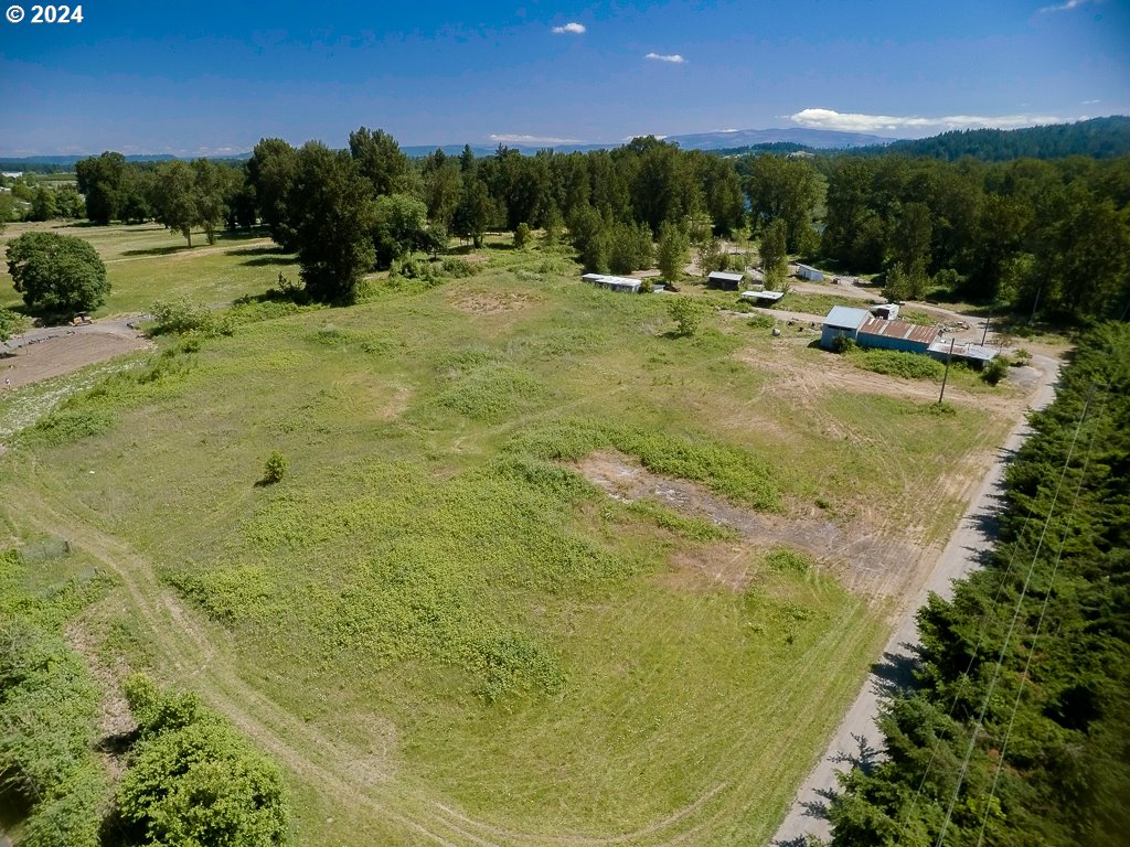 33065 Tennessee Road Southeast, Unit 2 Lebanon, OR 97355 - Photo 7 of 10 a view of a swimming pool with an outdoor seating and a yard