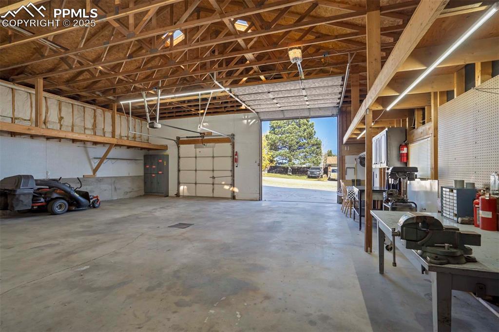 401 Cheyenne Street Calhan, CO 80808 - Photo 11 of 34 a view of a garage with storage