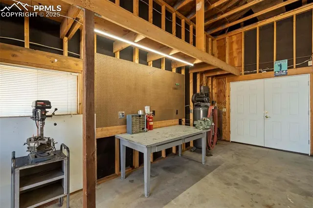 a view of a balcony with chairs
