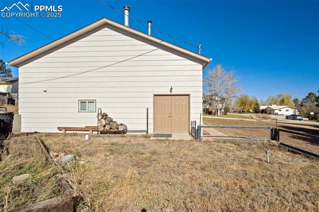 401 Cheyenne Street Calhan, CO 80808 - Photo 20 of 34 a view of a house with a patio