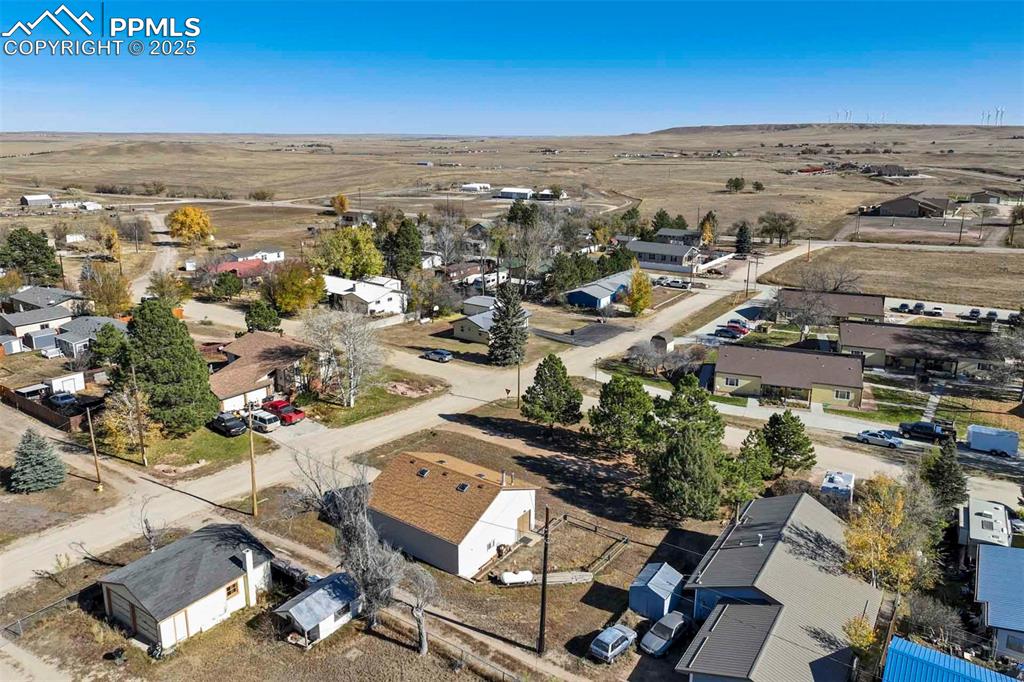 401 Cheyenne Street Calhan, CO 80808 - Photo 24 of 34 an aerial view of residential building and parking space