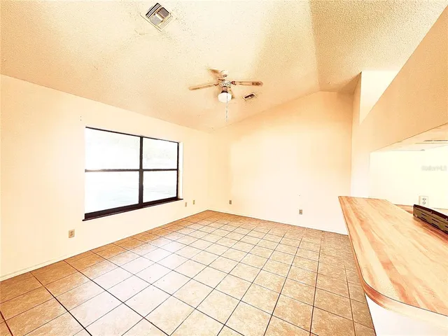 a view of a room with an empty space