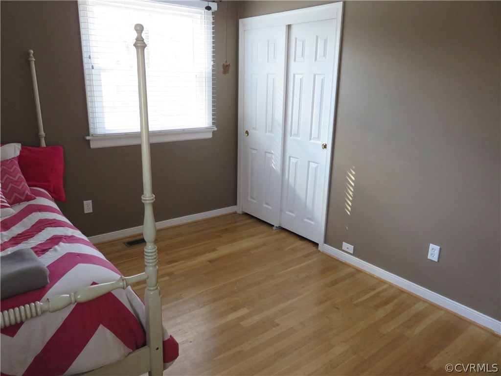 11006 Rockledge Road North Chesterfield, VA 23235 - Photo 28 of 43 a view of livingroom with hardwood floor and window