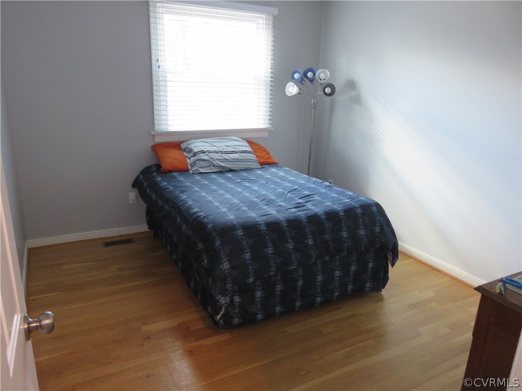 11006 Rockledge Road North Chesterfield, VA 23235 - Photo 29 of 43 a bedroom with a bed and window