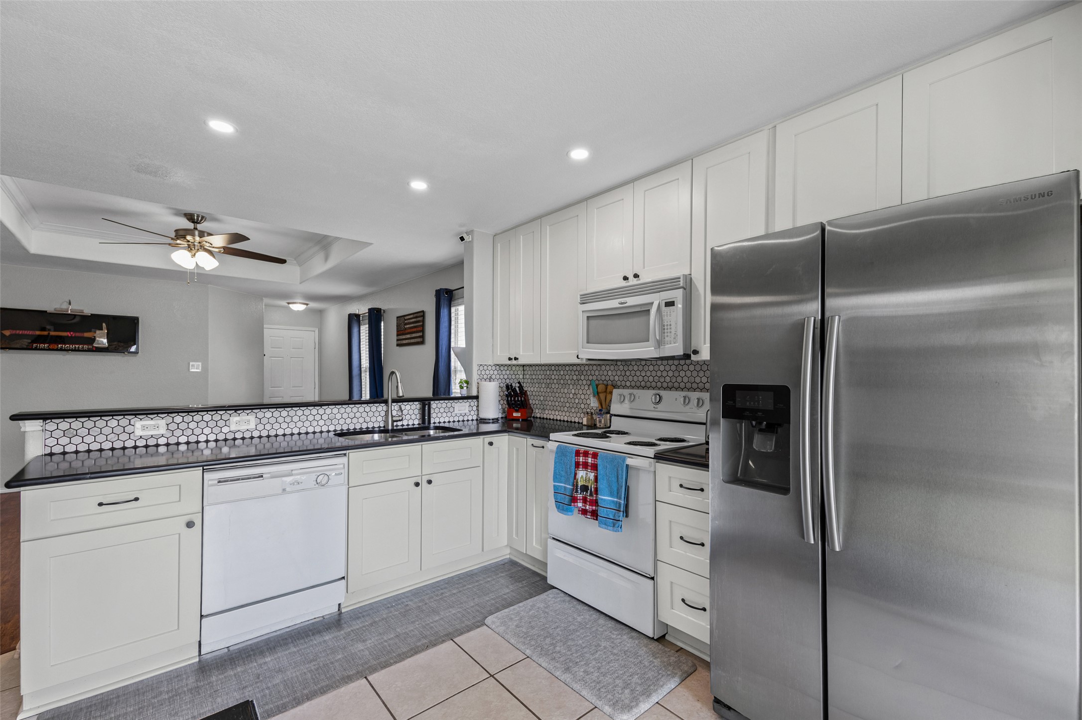 13501 Lismore Lane Pflugerville, TX 78660 - Photo 6 of 28 Fully remodeled kitchen with soft close cabinets and granite countertops