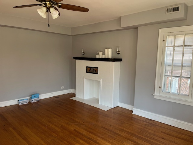 7804 South Burnham Avenue, Unit 2 Chicago, IL 60649 - Photo 3 of 9 a view of a livingroom with wooden floor