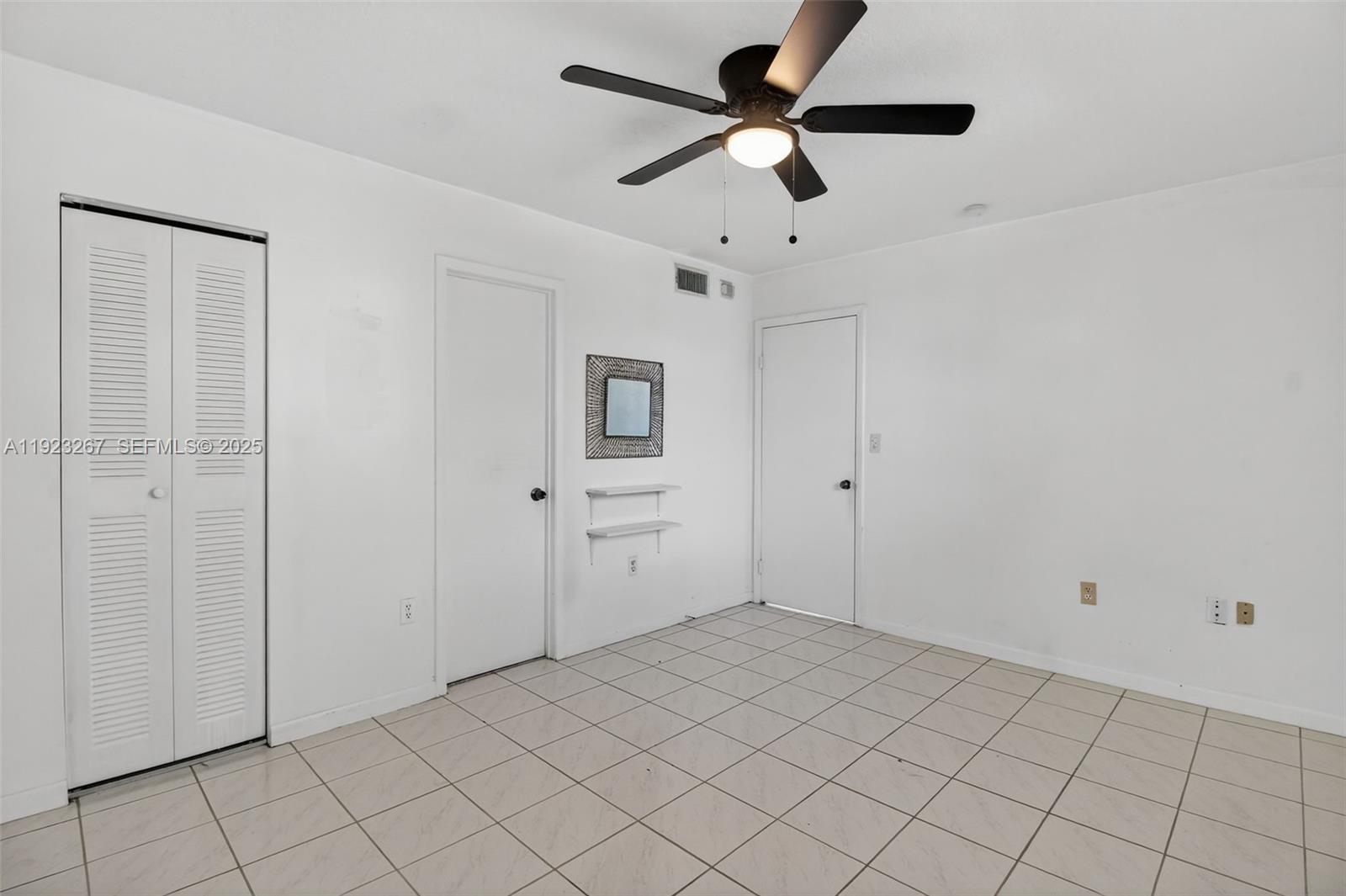 11309 Southwest 200th Street, Unit 209C Miami, FL 33157 - Photo 11 of 28 a view of an empty room