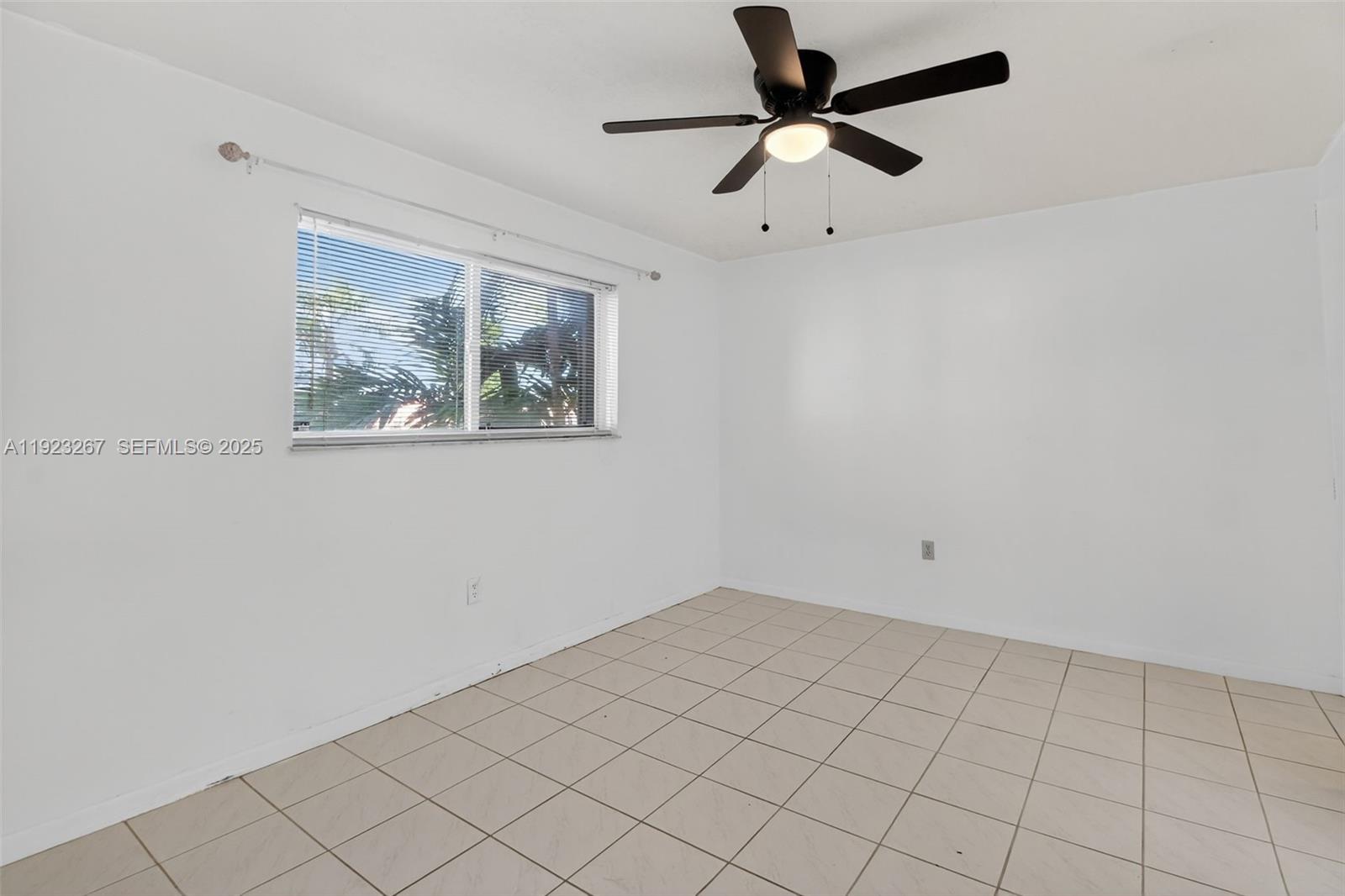 11309 Southwest 200th Street, Unit 209C Miami, FL 33157 - Photo 12 of 28 a view of an empty room