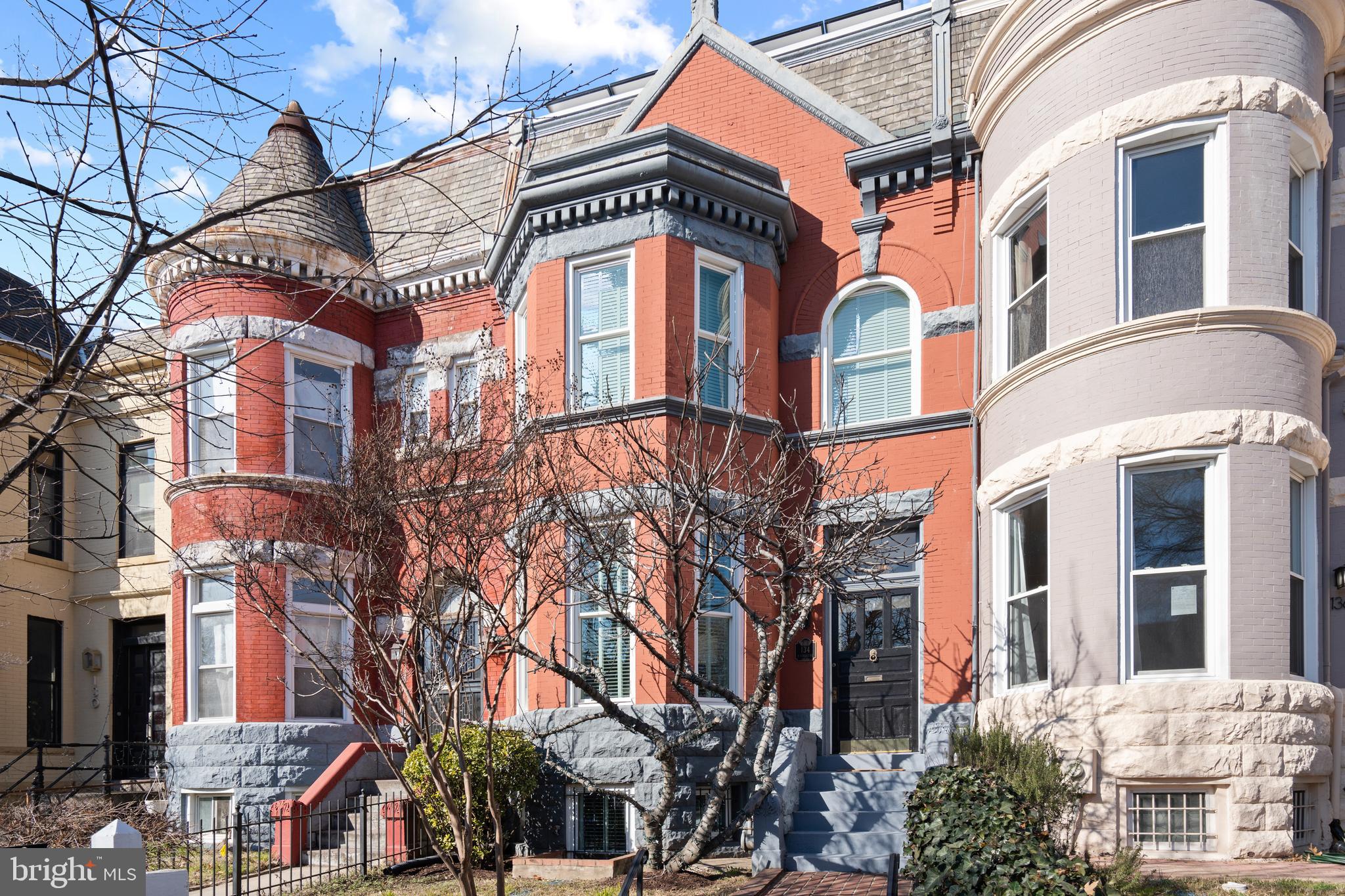 134 R Street Northeast Washington, DC 20002 - Photo 2 of 10 Stately row home with windows.