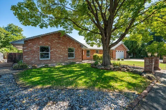 a bathroom with a double vanity sink mirror and