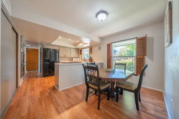 a bathroom with a shower and a bath tub
