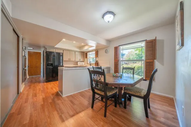 a bathroom with a shower and a bath tub