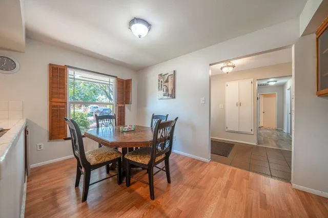 a kitchen with stainless steel appliances a refrigerator stove and sink