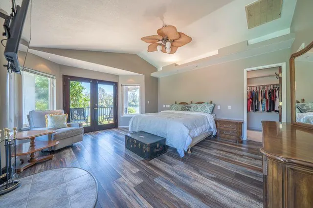 a view of a house with a backyard porch and sitting area