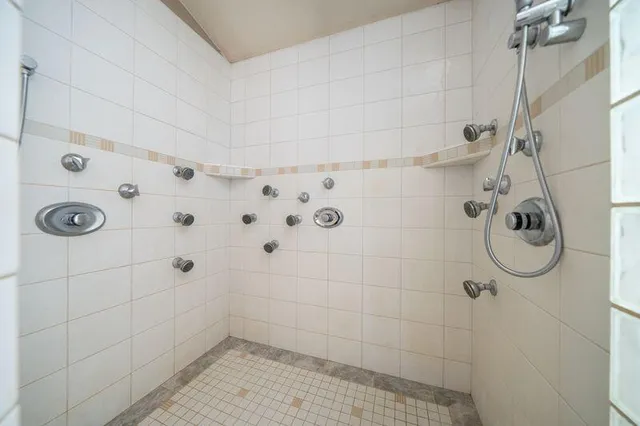 a view of swimming pool is middle in the garden