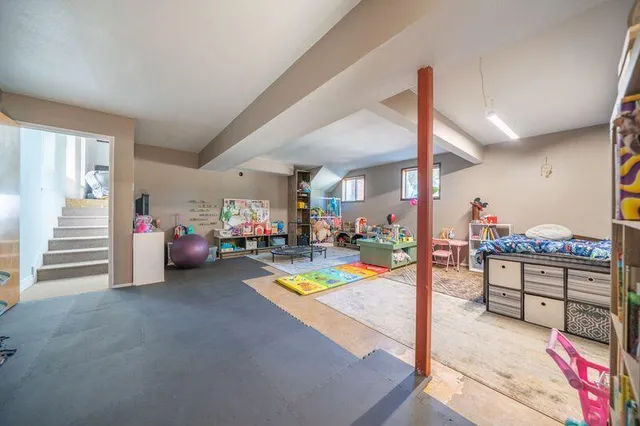 a view of a lake with houses in the background