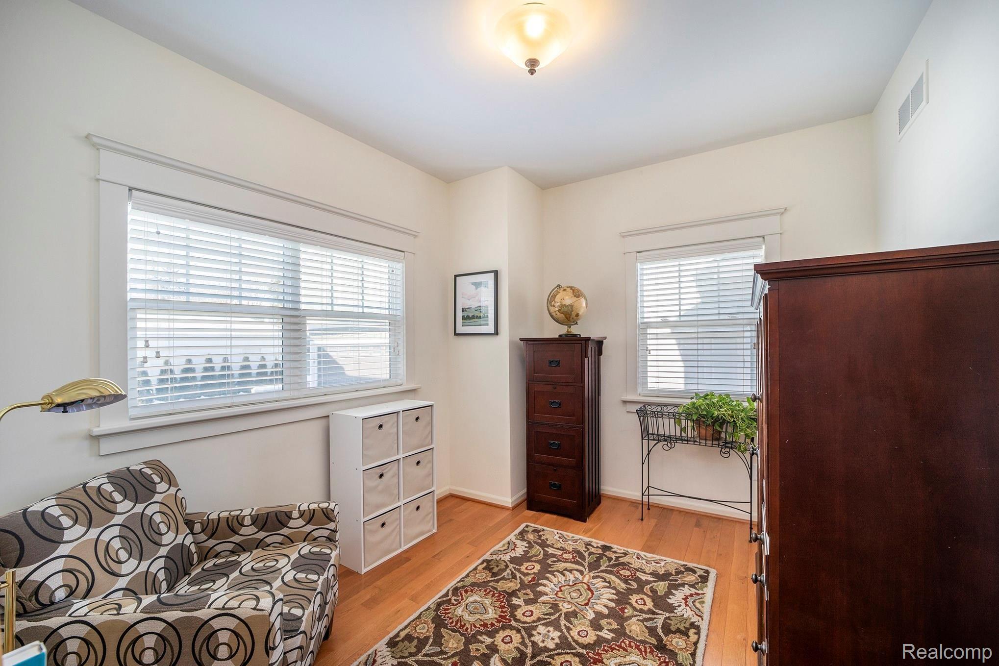 937 Ruffner Avenue Birmingham, MI 48009 - Photo 13 of 39 Den features hardwood flooring, and two windows for plenty of natural lighting.