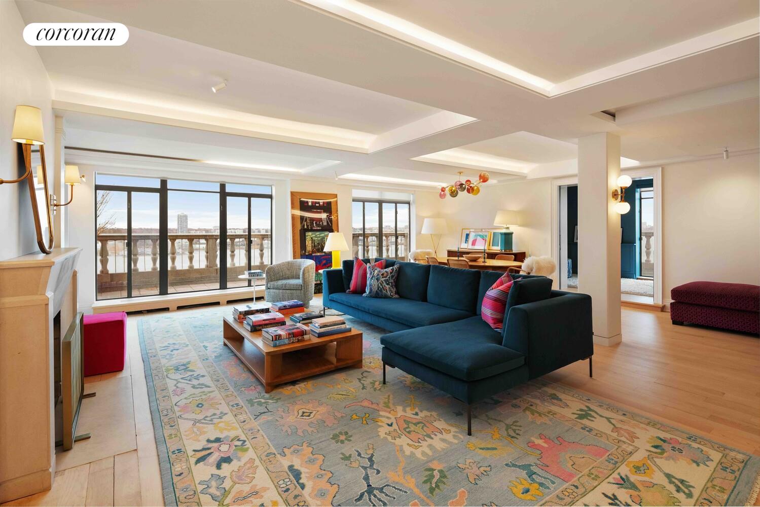 140 Riverside Drive, Unit 19HO Manhattan, NY 10024 - Photo 18 of 35 a living room with furniture and a large window