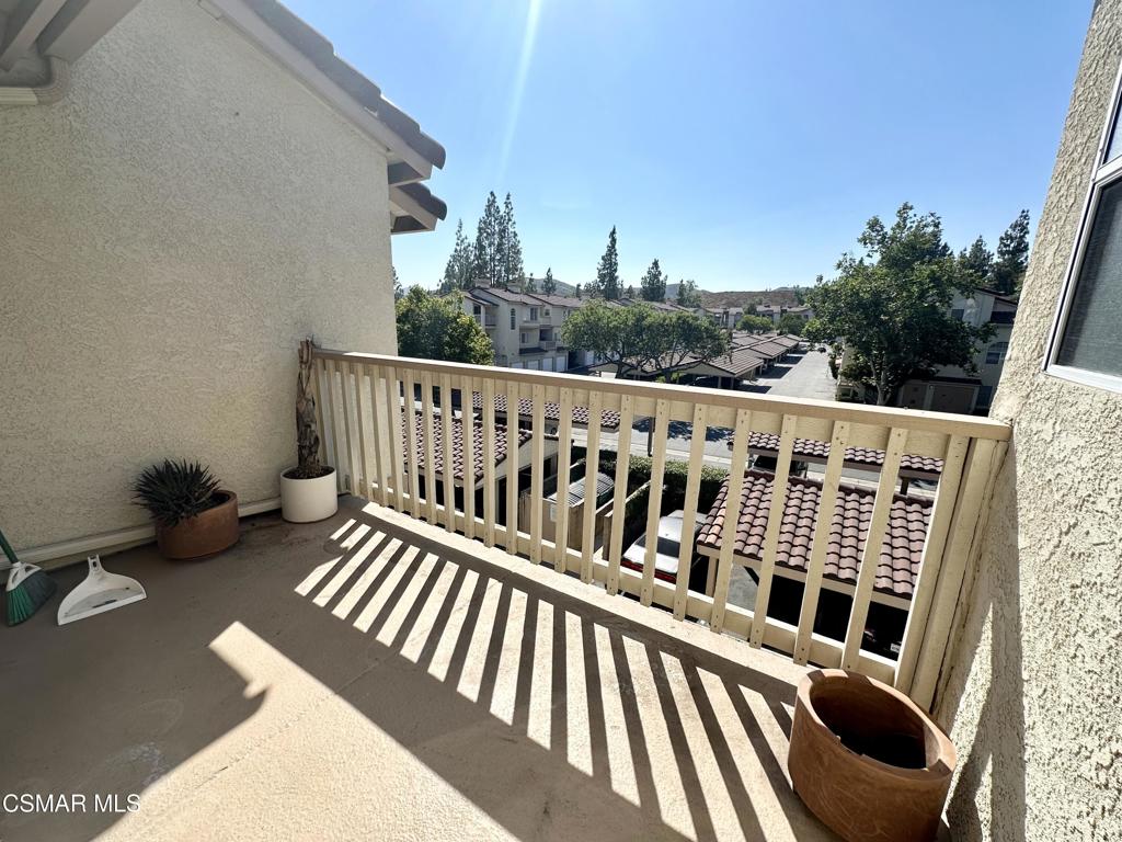 672 Indian Oak Lane, Unit 103 Oak Park, CA 91377 - Photo 15 of 34 a view of balcony with furniture