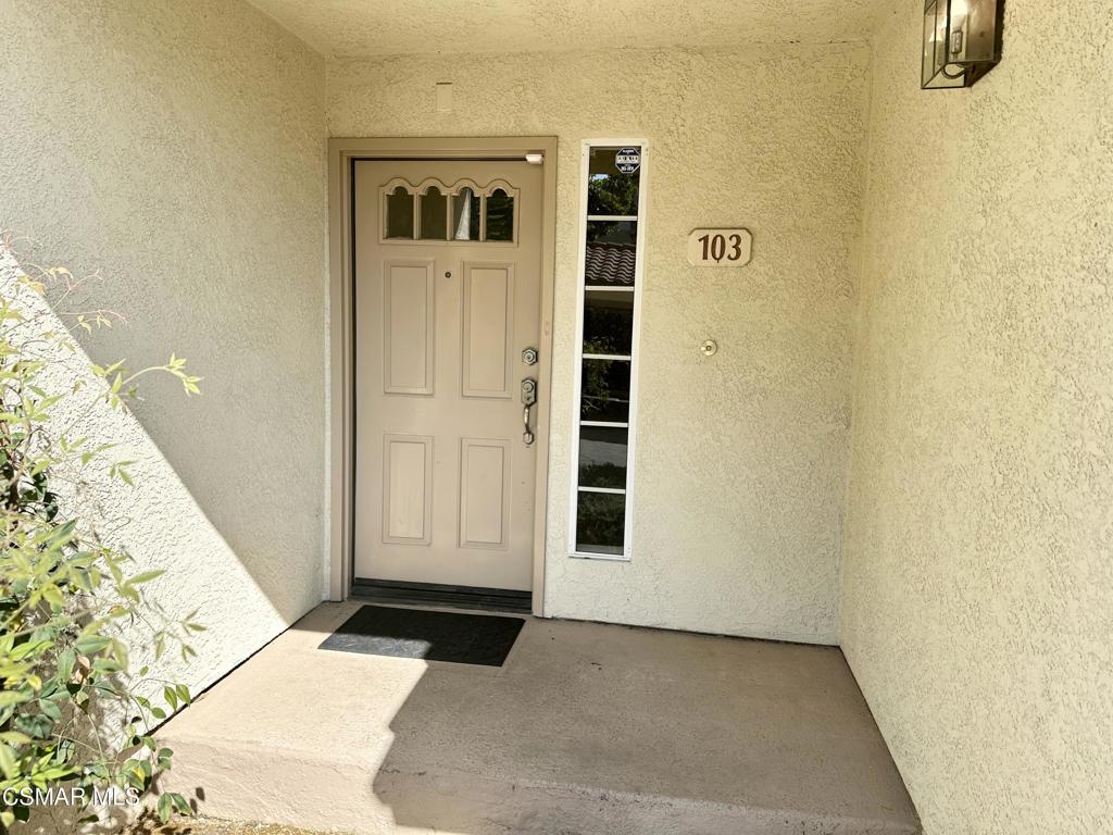 672 Indian Oak Lane, Unit 103 Oak Park, CA 91377 - Photo 2 of 34 a view of front door of house