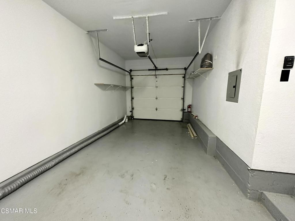 672 Indian Oak Lane, Unit 103 Oak Park, CA 91377 - Photo 23 of 34 a view of a garage
